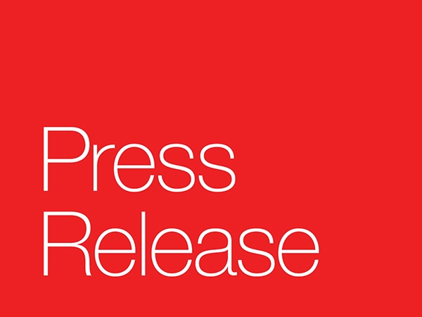 Red background with white text that says Press Release