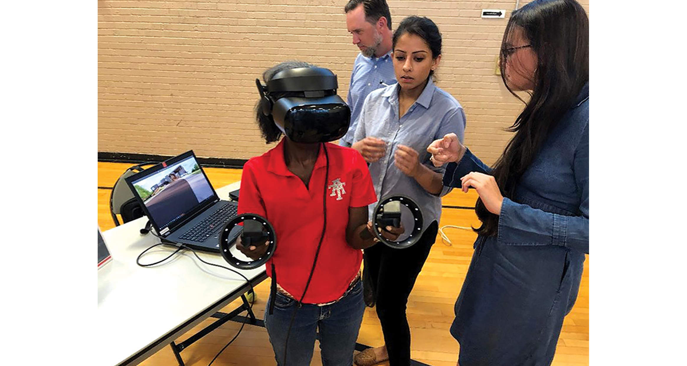 The community engages in an immersive virtual reality tour of the building