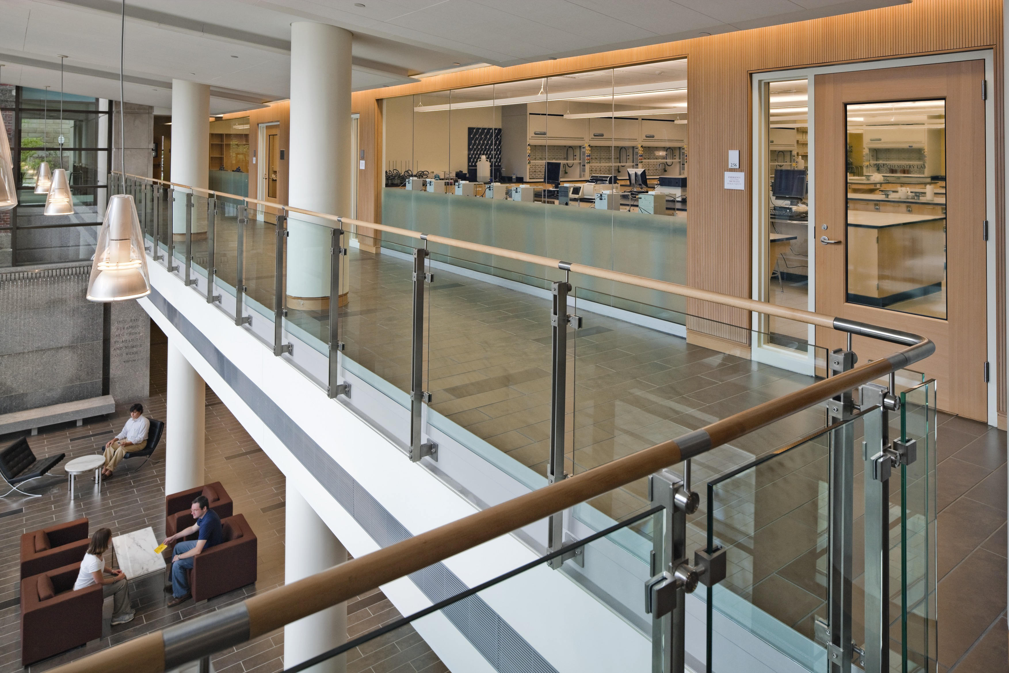 Hallway with views into a lab
