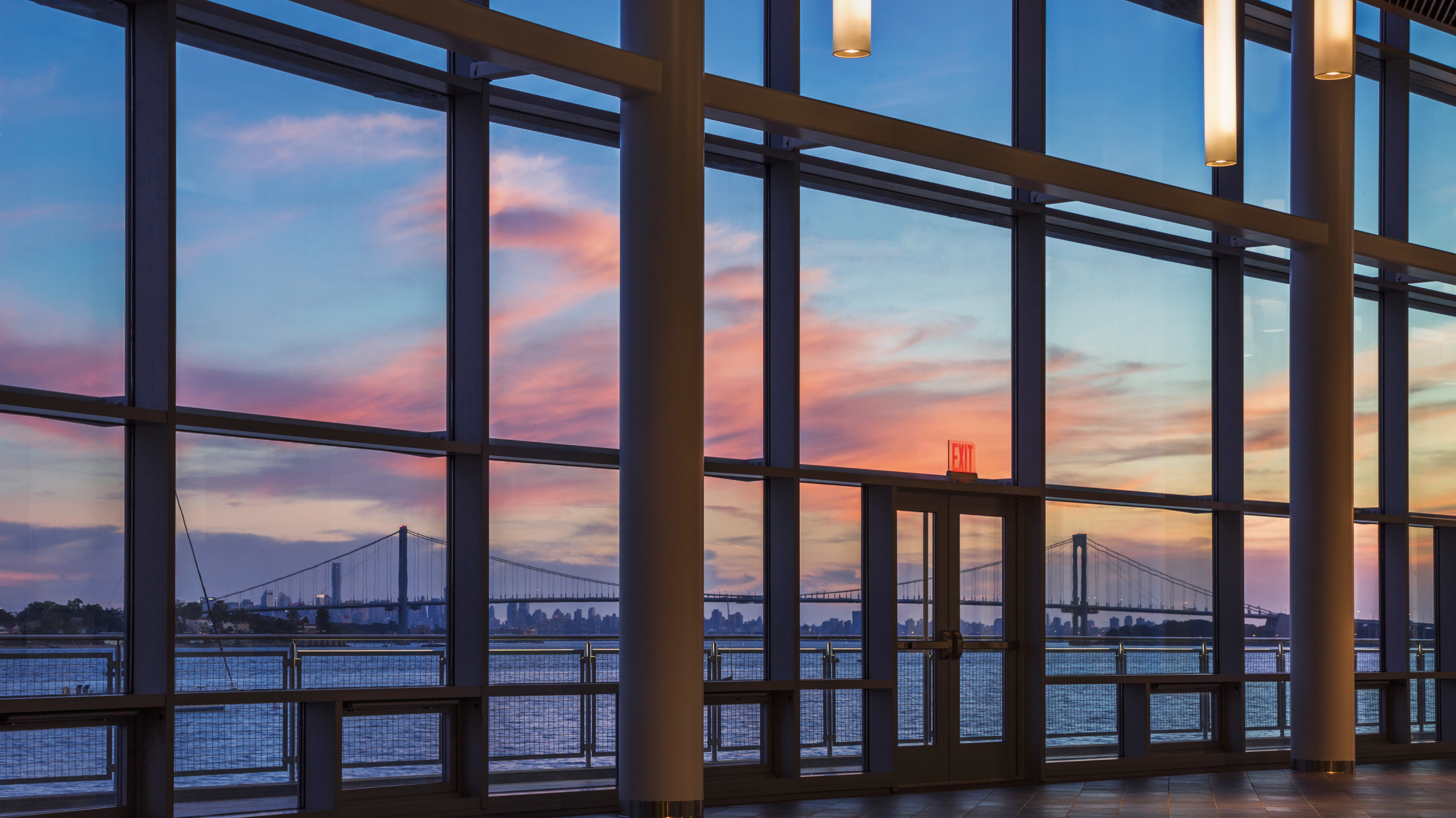 Expansive windows provide ample view of the harbor