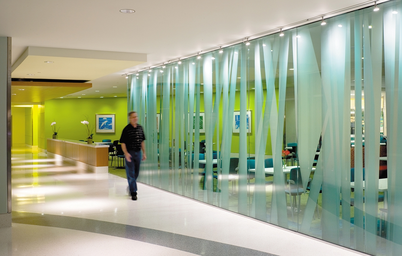 Privacy glazing on glass wall