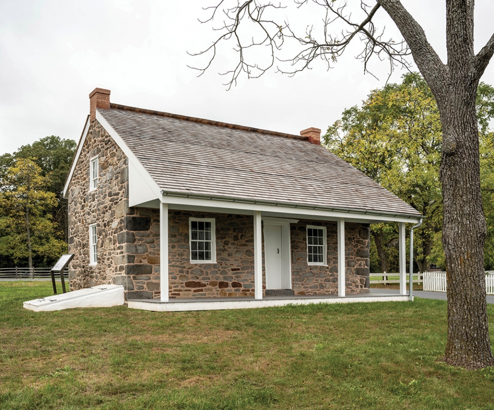 Looking at the front of the restored Warfield House