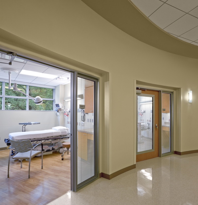 curved hallway with exam rooms