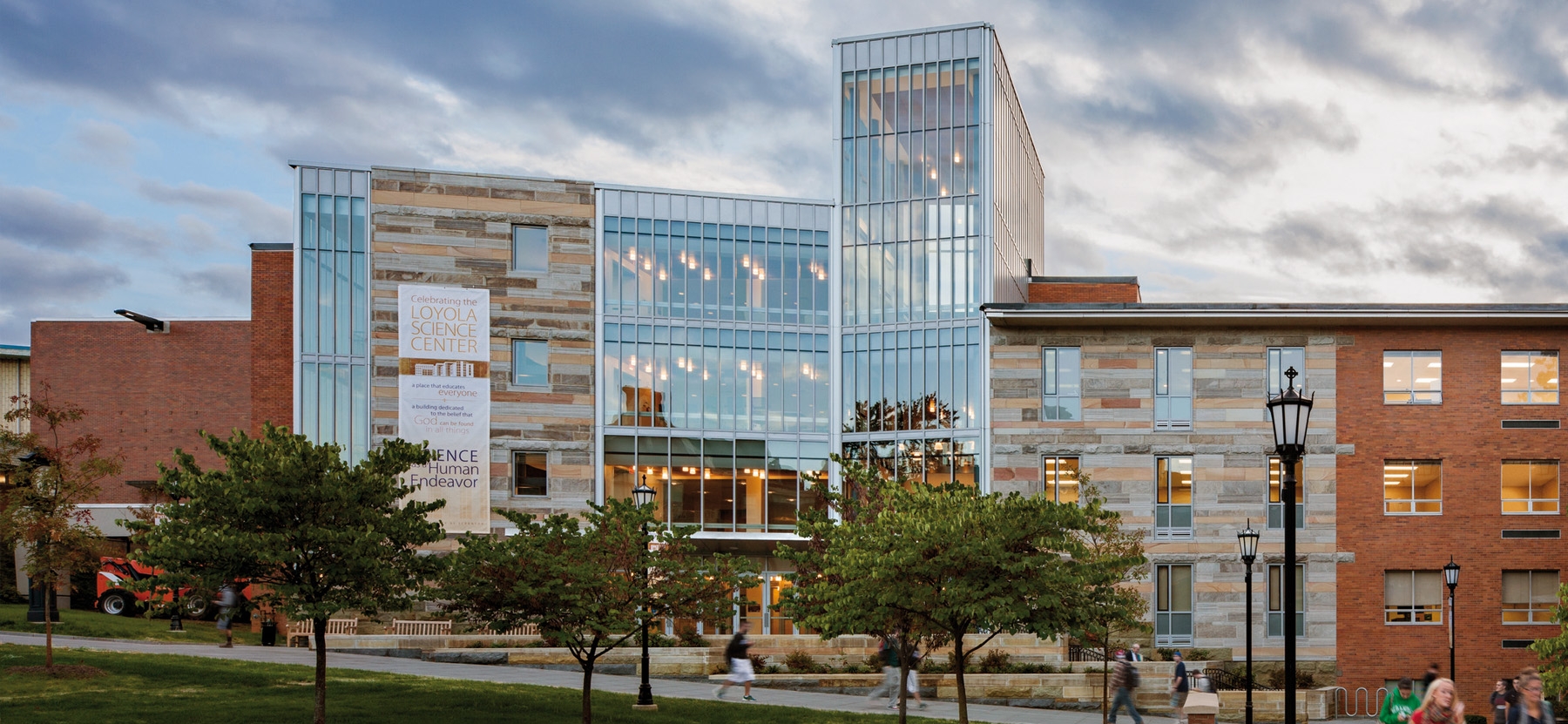 Exterior facade of Loyola Science Center at dusk