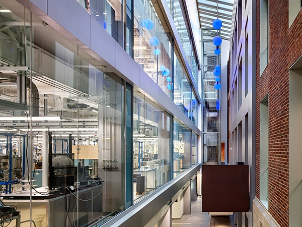Interior image of where the existing building meets the new modern lab space