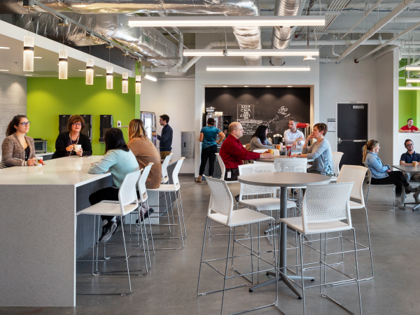 people gathering in workplace lounge