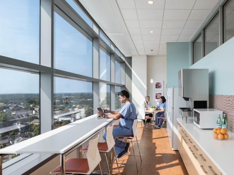 Interior healthcare staff in common space.