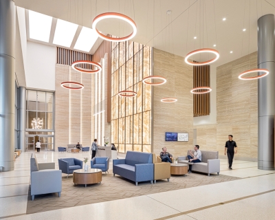 Lobby with floor to ceiling windows and a skylight to provide ample natural light.