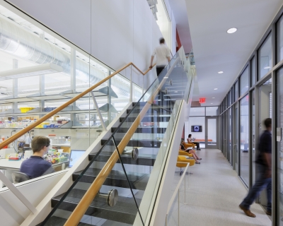 Hallway with views into lab