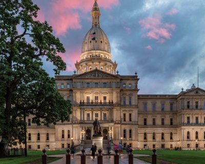 Exterior view of Michigan state capitol at sunset